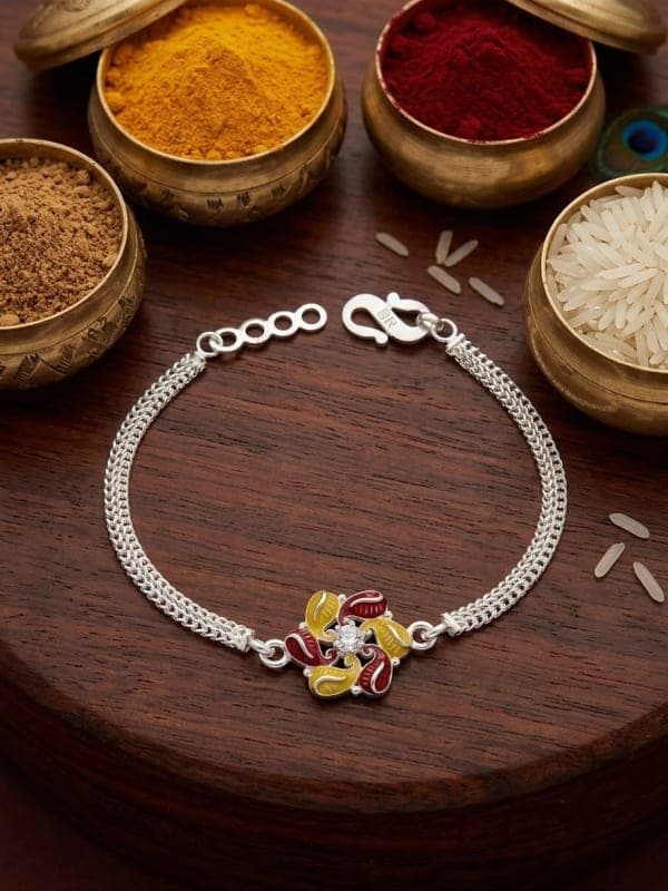 divine prosperity – designer silver plated rakhi by Lawanyam - View 1