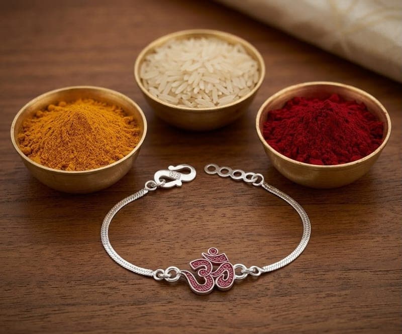 divine om blessings – designer silver plated rakhi by Lawanyam - View 1