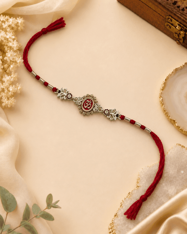 om heritage – designer silver plated rakhi by Lawanyam - View 1